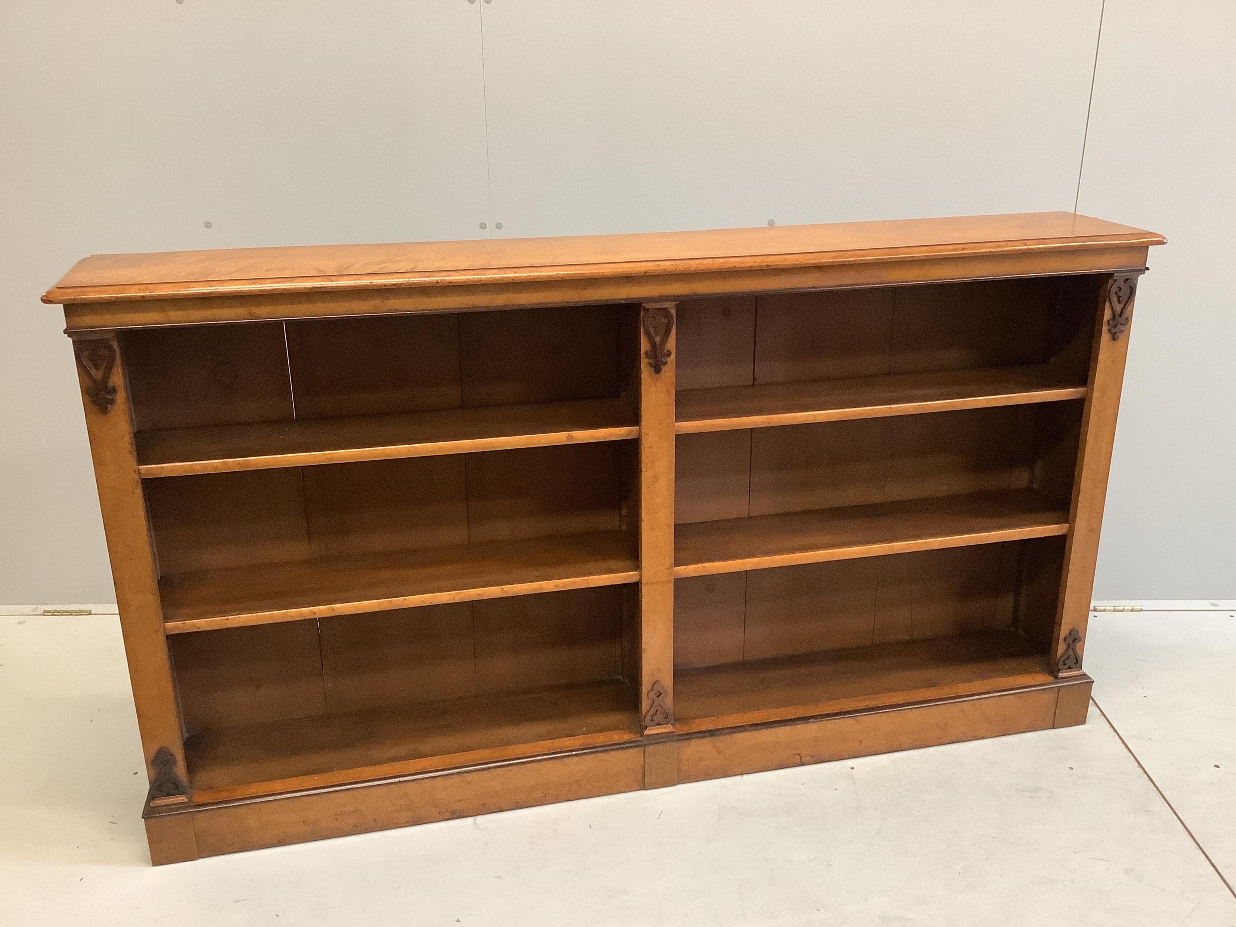 A Victorian bird's eye maple dwarf open bookcase, width 172cm, depth 27cm, height 95cm. Condition - good